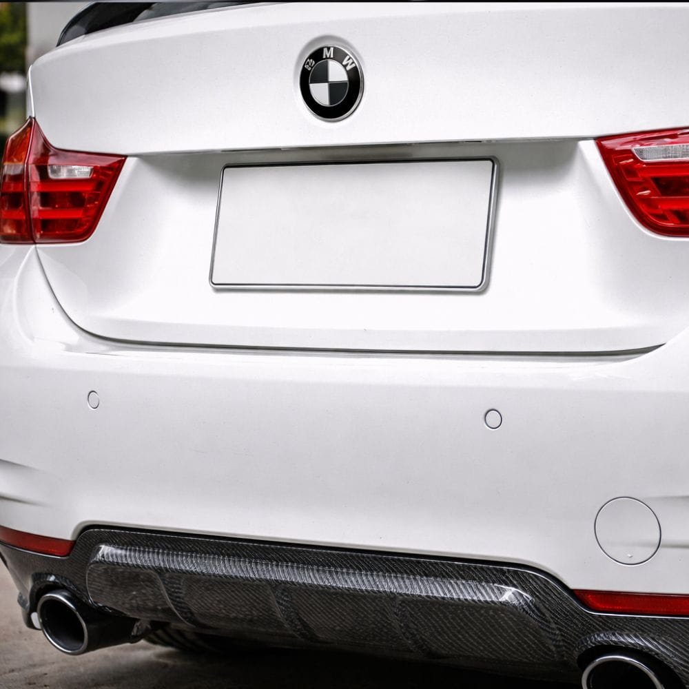 Insignia BMW blanca y negra 74 MM para maletero serie 2, 3, 4.