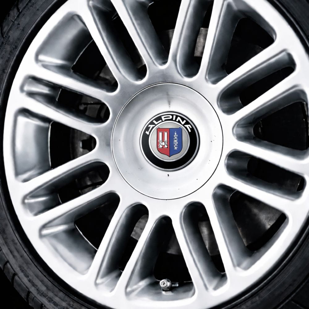 Emblema adhesivo Alpina de 65 mm con relieve para llantas