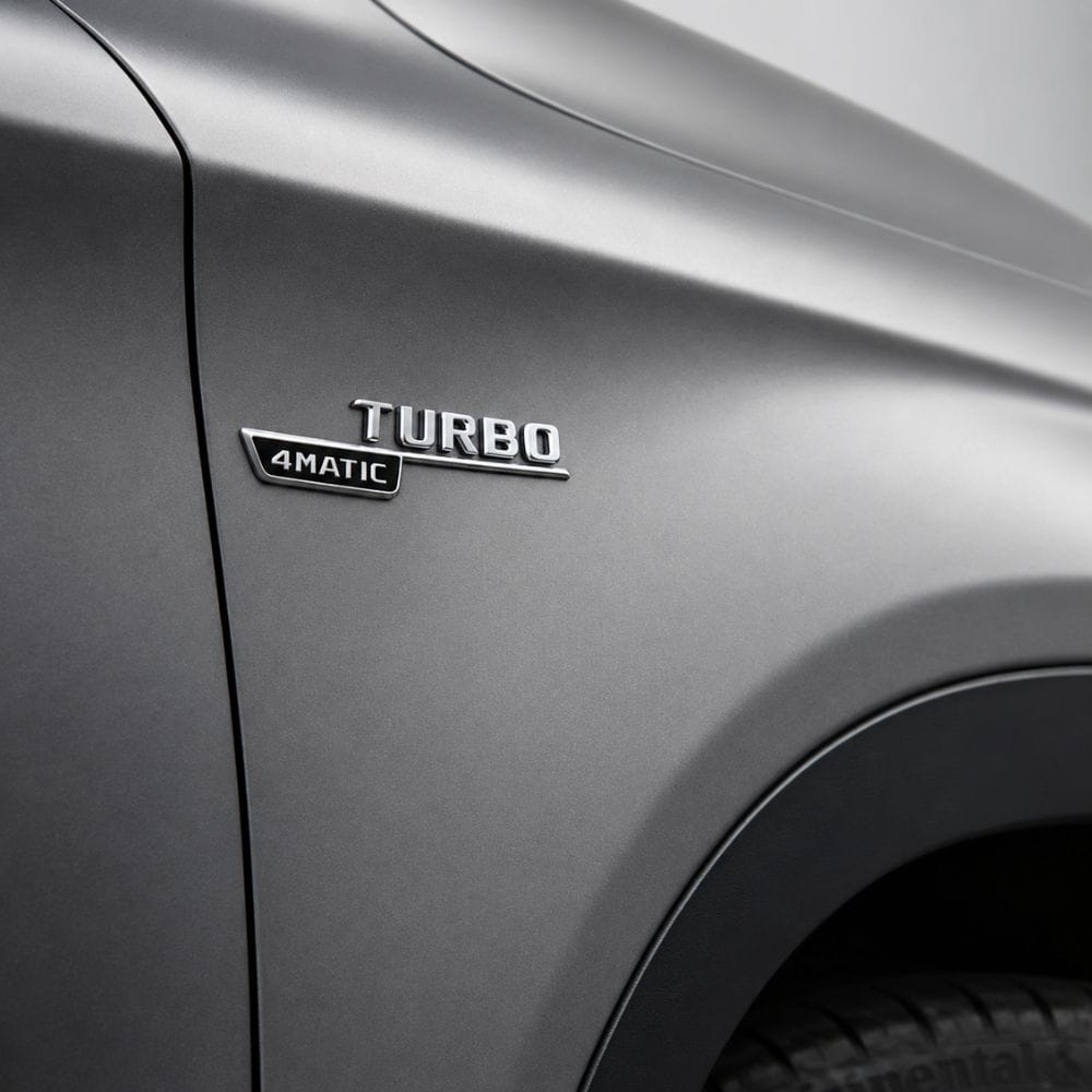 Emblema TURBO 4MATIC para aletas laterales cromado con AMG cromado