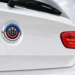 Emblema BMW 50 Aniversario negro con acabado de carbono de 82 MM
